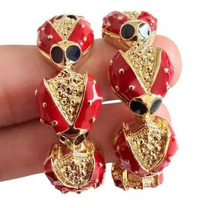 Kenneth Jay Lane Red and Gold napkins  Holders rings